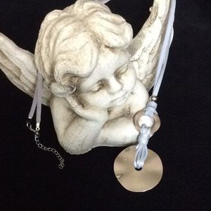 🐞 Silver colored metal pendant on light blue suede cord
